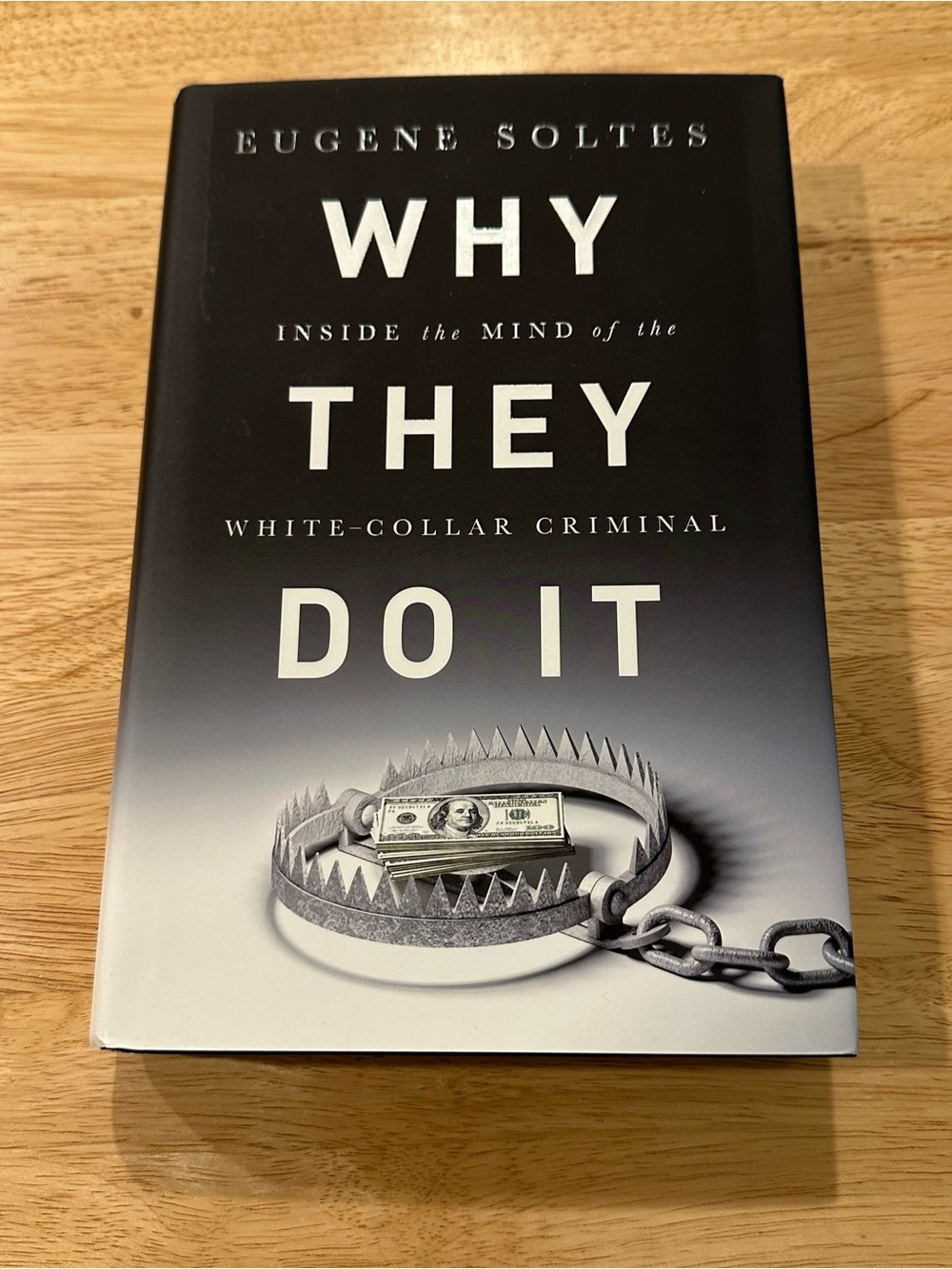 Why They Do It Hardcover Book — Black/Gray